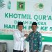 Fathurrahman saat berfoto dengan Mohamad Taufiq Ketua DPC PPP  Kabupaten Muaro Jambi (foto: Dn)