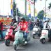 Pj Bupati Muaro jambi Bachyuni Deliansyah,SH.MH ikut mengendarai sepeda motor Vespa kesayangan nya saat Sunday Morning Side (Sunmori). (Dok. Humas Kominfo)